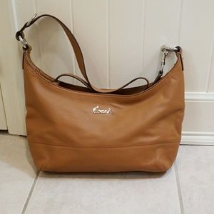 NWOT cross body coach purse.